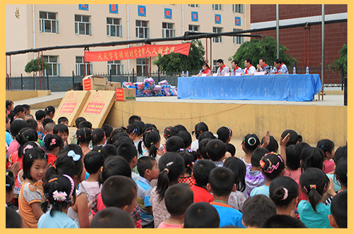 建投能源为灵寿县寨头明德小学捐赠文体用品.jpg